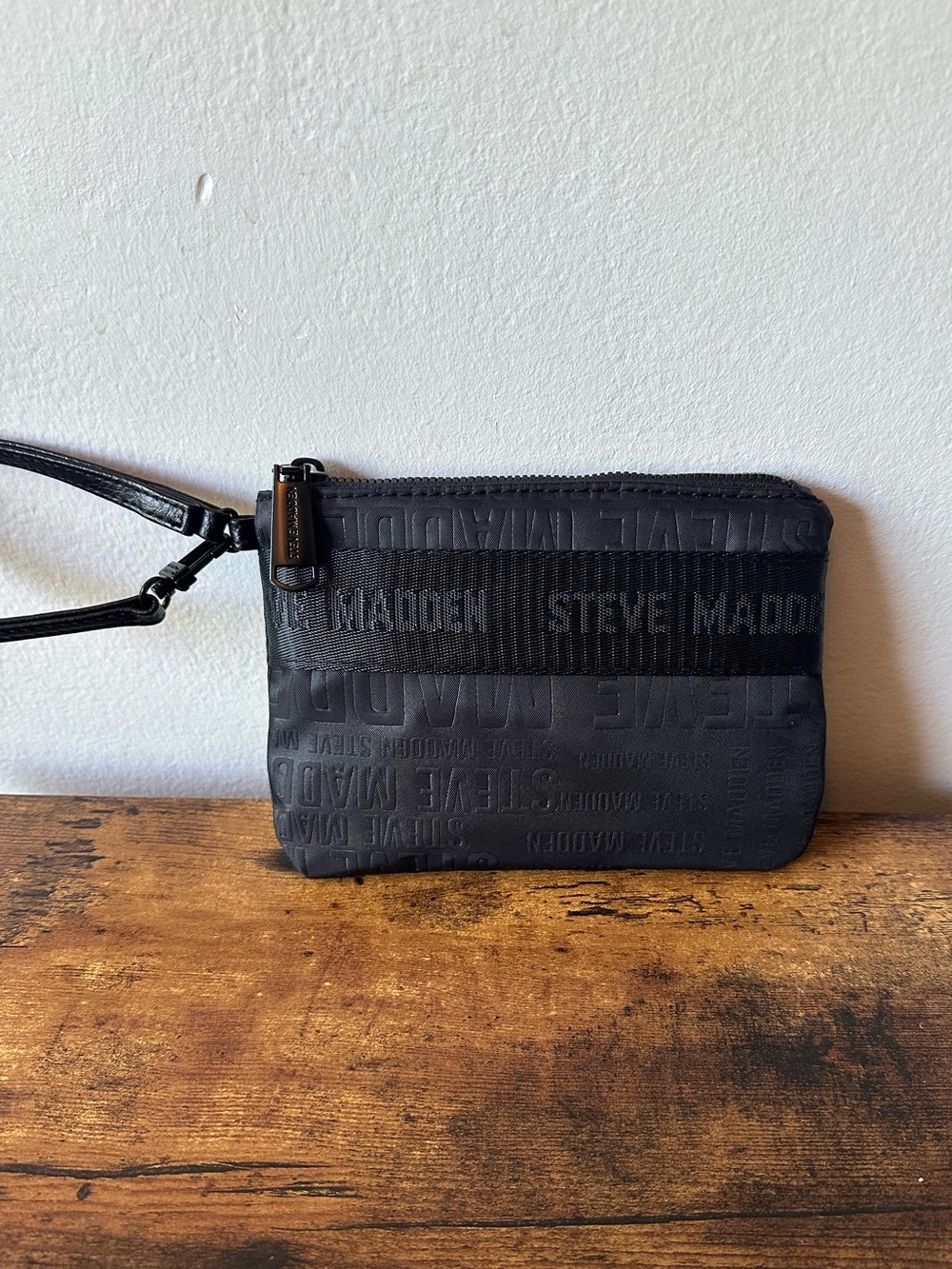 Steve Madden Black on Black Embossed Logo Wristlet Pouch New Without Tag